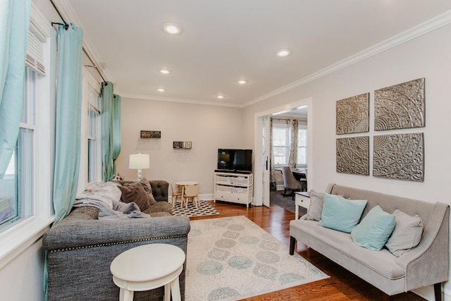 living room with ornamental molding and dark wood-type flooring