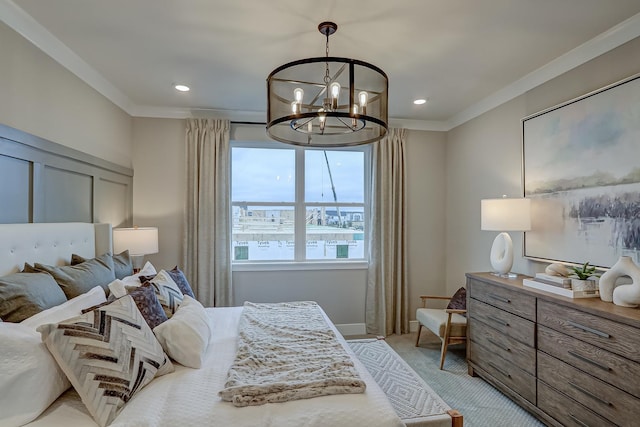 carpeted bedroom featuring ornamental molding and an inviting chandelier