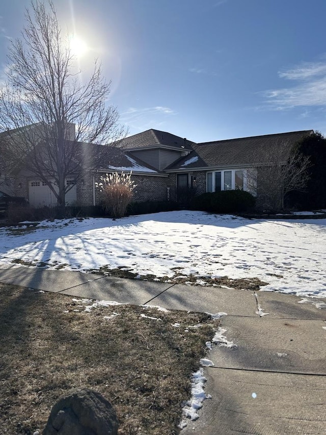 view of snow covered property