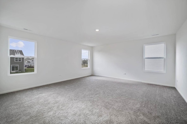 empty room featuring carpet flooring