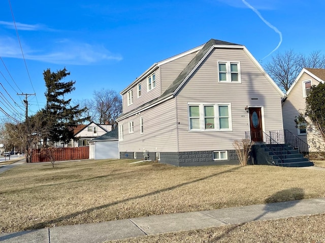 view of front of property with a front lawn