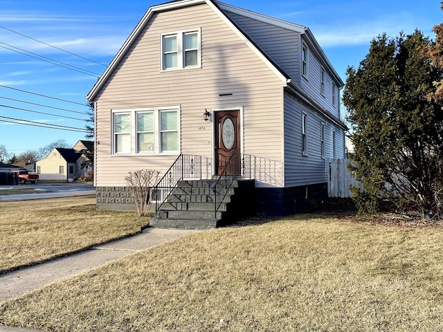 view of front of home featuring a front lawn