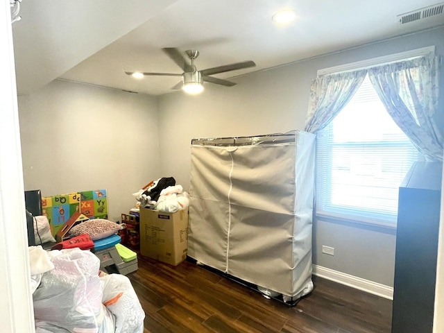 interior space featuring ceiling fan