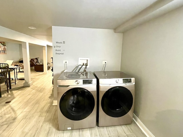 laundry room with washer and clothes dryer