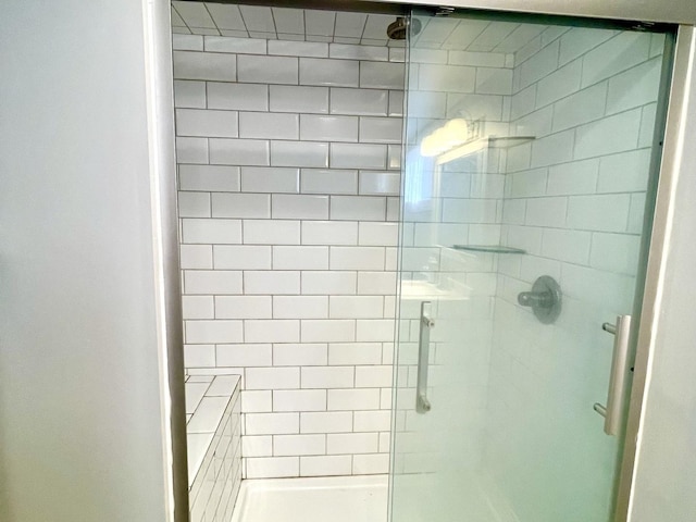 bathroom with an enclosed shower