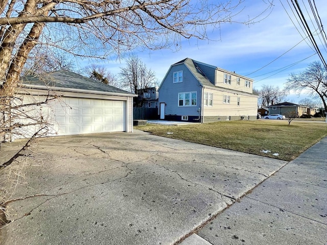 view of side of home featuring a lawn