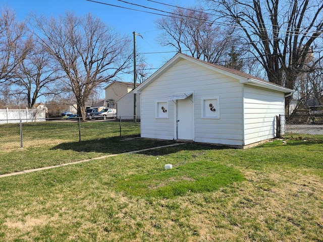 view of outdoor structure featuring a yard