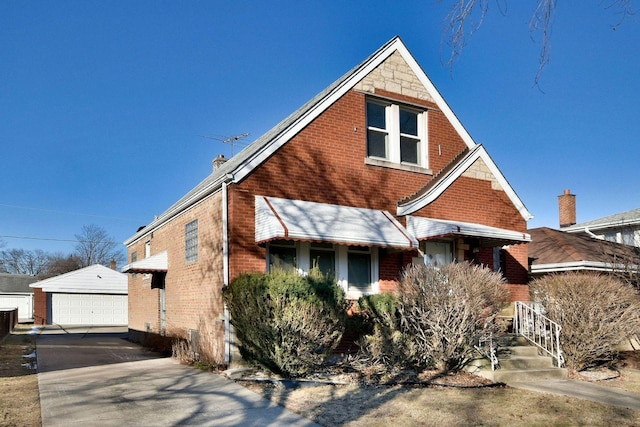 view of front of house featuring an outbuilding and a garage