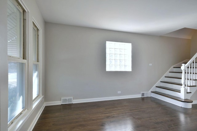 interior space with dark hardwood / wood-style floors