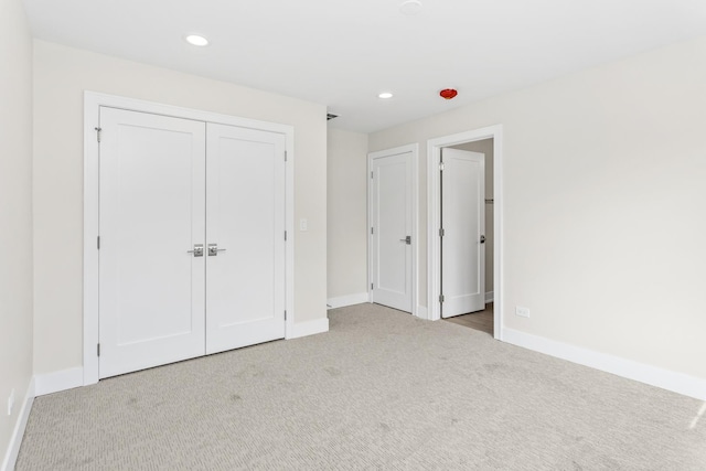 unfurnished bedroom featuring carpet