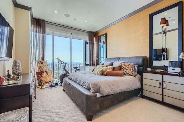 carpeted bedroom with crown molding, access to outside, and floor to ceiling windows