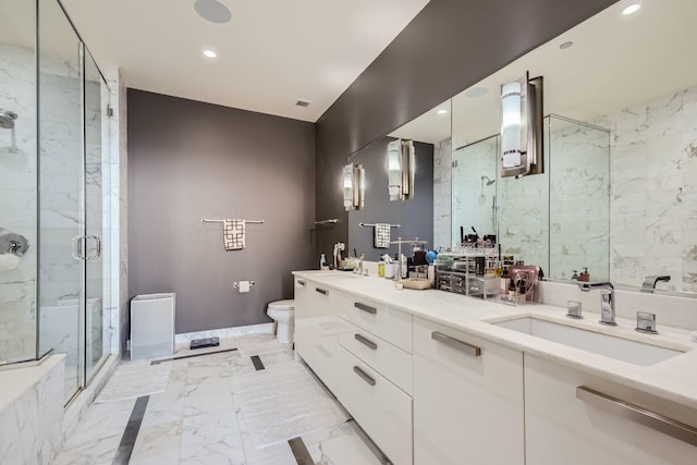 bathroom featuring walk in shower, vanity, and toilet