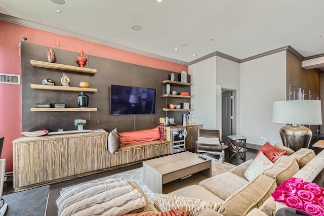 living room with wood-type flooring, ornamental molding, and wine cooler