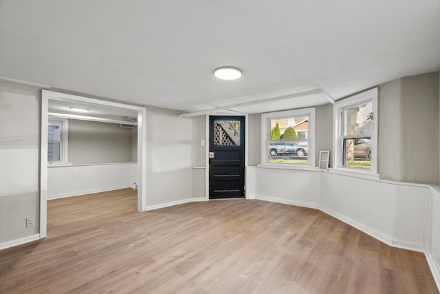 foyer entrance featuring hardwood / wood-style flooring