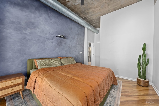 1000 W 15th St Unit 116, Chicago, IL 60608 - bedroom with wood finished floors, baseboards, and ceiling fan