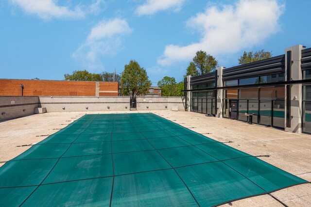 1000 W 15th St Unit 116, Chicago, IL 60608 - view of pool with a fenced backyard and a patio