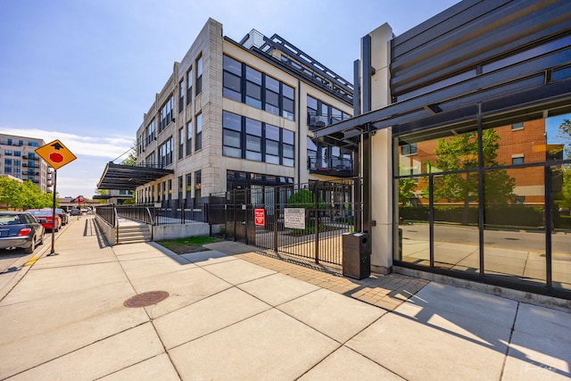 1000 W 15th St Unit 116, Chicago, IL 60608 - view of building exterior featuring fence