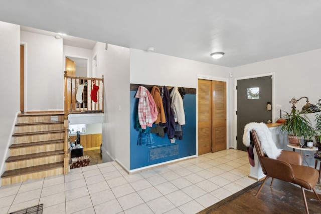 entryway featuring light tile patterned floors