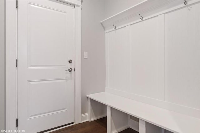 mudroom with dark hardwood / wood-style floors