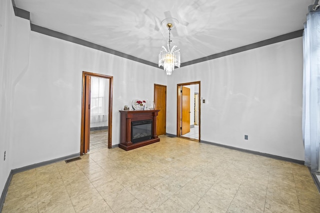 unfurnished living room featuring an inviting chandelier