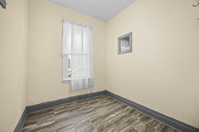 unfurnished room featuring wood-type flooring