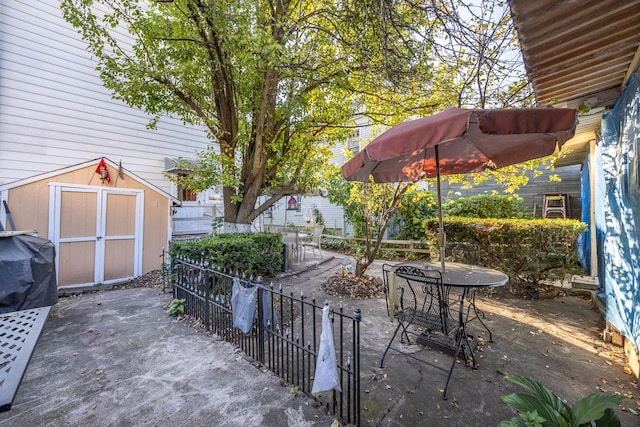 view of patio / terrace featuring a shed