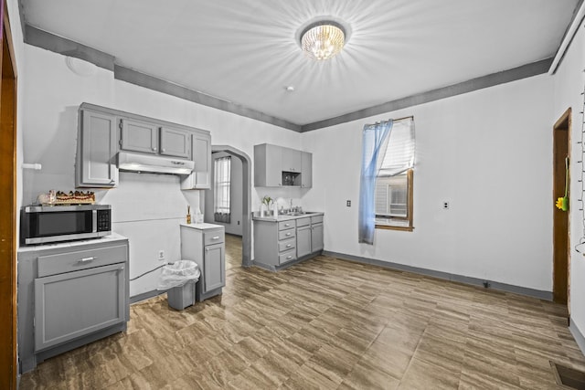 kitchen featuring gray cabinets