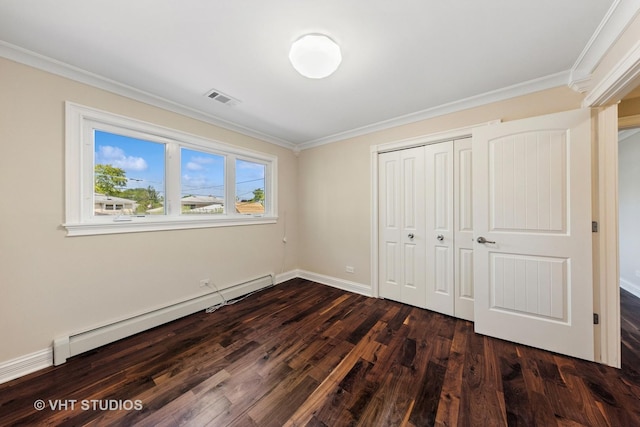 unfurnished bedroom with a baseboard radiator, ornamental molding, dark wood-type flooring, and a closet