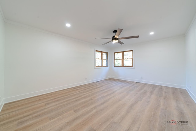 unfurnished room featuring crown molding, light hardwood / wood-style floors, and ceiling fan