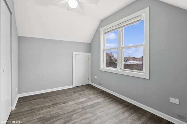 bonus room featuring hardwood / wood-style flooring, lofted ceiling, and ceiling fan