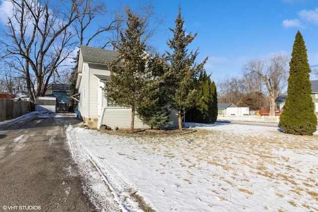 view of snow covered property