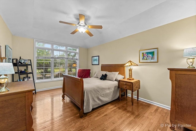 bedroom featuring ceiling fan and light hardwood / wood-style floors