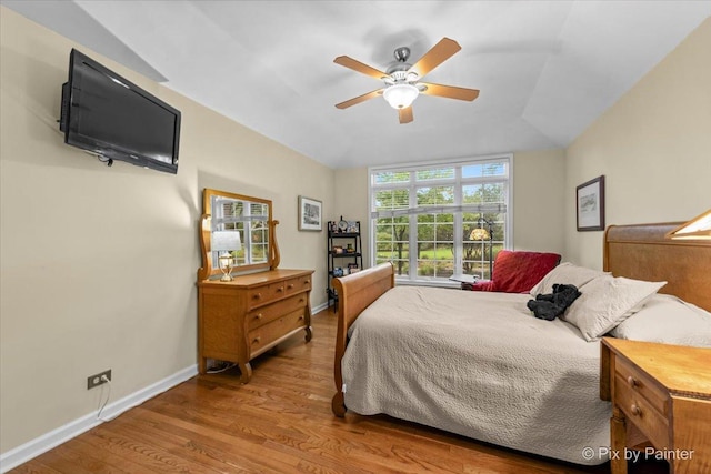 bedroom featuring wood-type flooring and ceiling fan