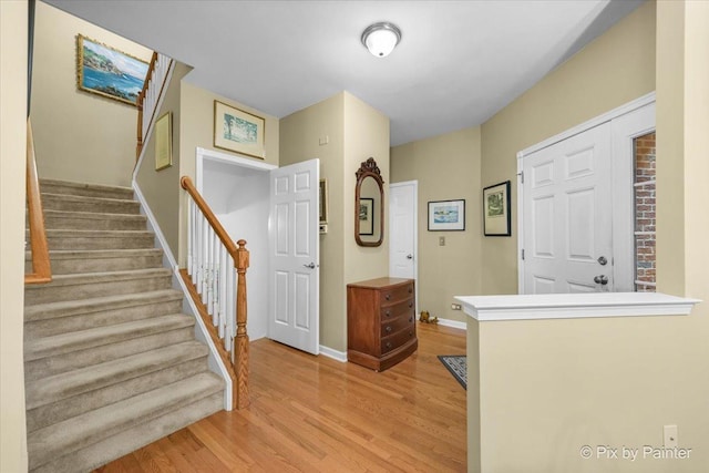 entryway with light hardwood / wood-style floors