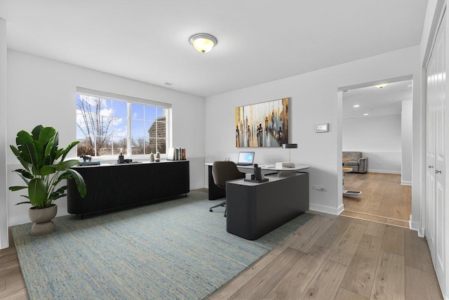 office space featuring wood-type flooring