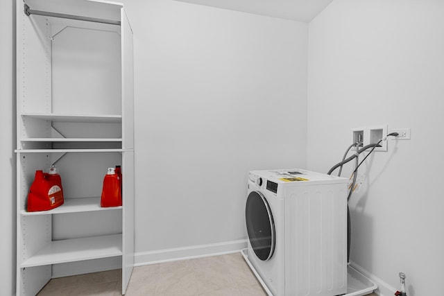 laundry room with washer / dryer