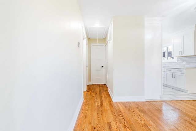 corridor featuring light hardwood / wood-style flooring