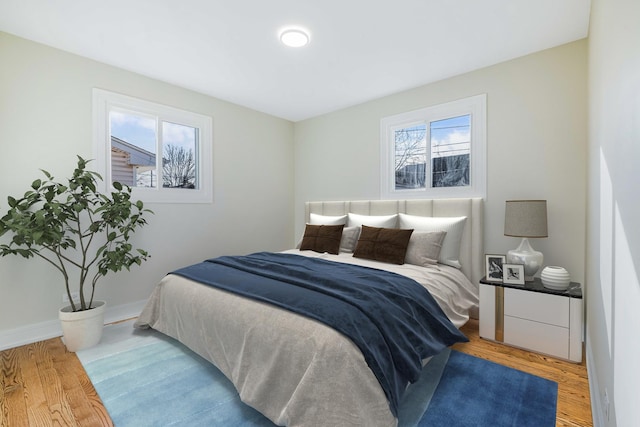 bedroom featuring wood-type flooring