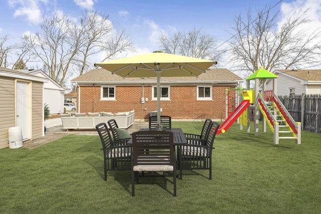 back of property with a playground, an outdoor hangout area, and a lawn