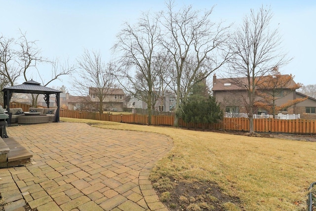 view of yard featuring a gazebo, a patio area, and outdoor lounge area