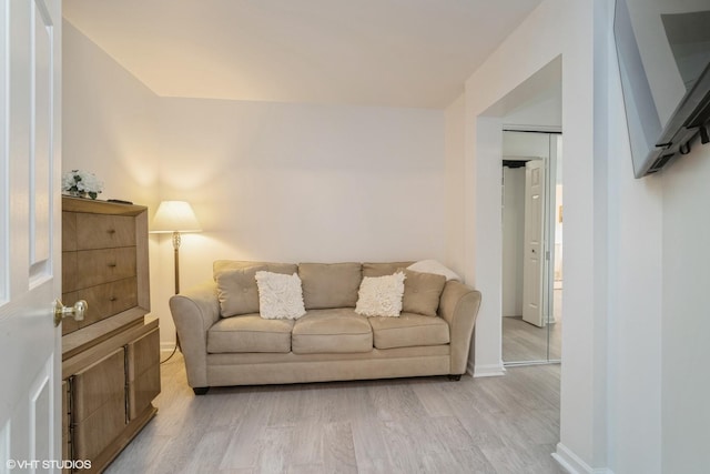 living room with light hardwood / wood-style floors