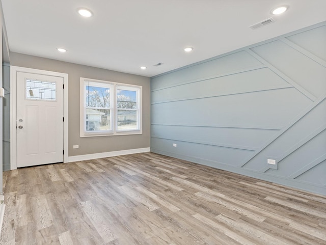 foyer with light wood-type flooring