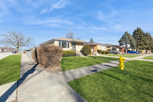 single story home with a front yard