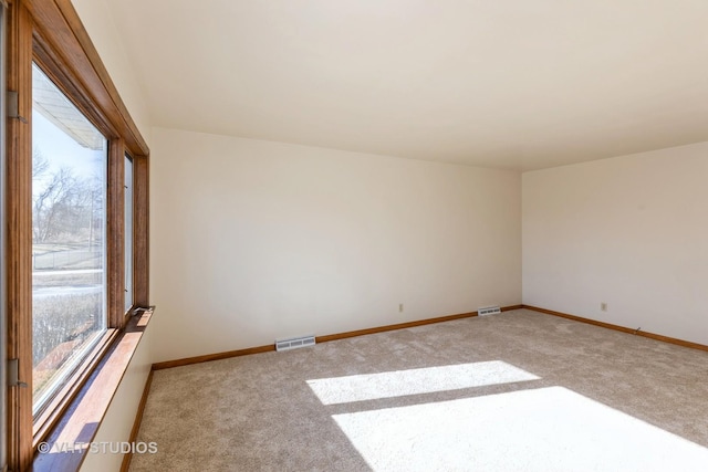 view of carpeted spare room