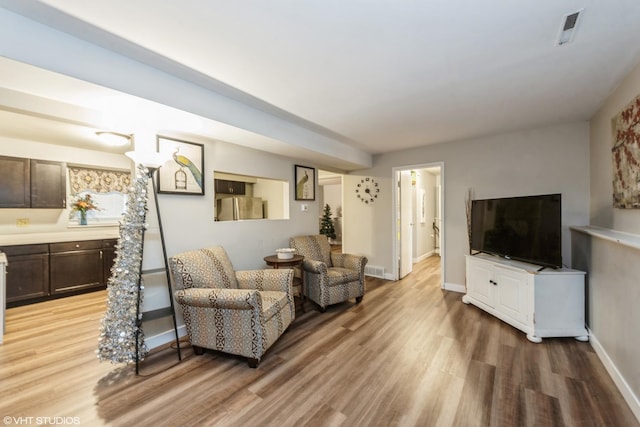 living room with hardwood / wood-style flooring