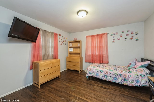 bedroom featuring dark wood-type flooring