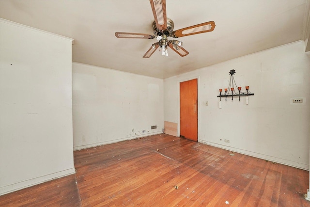 unfurnished room featuring ceiling fan and wood-type flooring