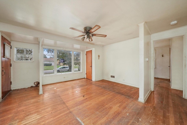 unfurnished room featuring wood-type flooring and ceiling fan