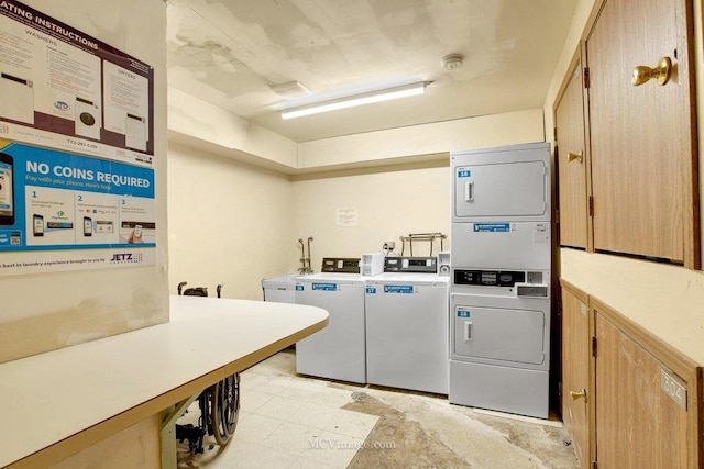 washroom featuring stacked washer / drying machine and independent washer and dryer