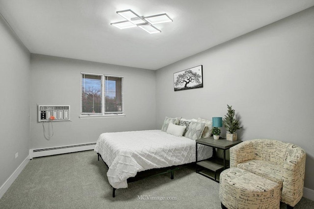 carpeted bedroom featuring a baseboard heating unit and a wall mounted AC